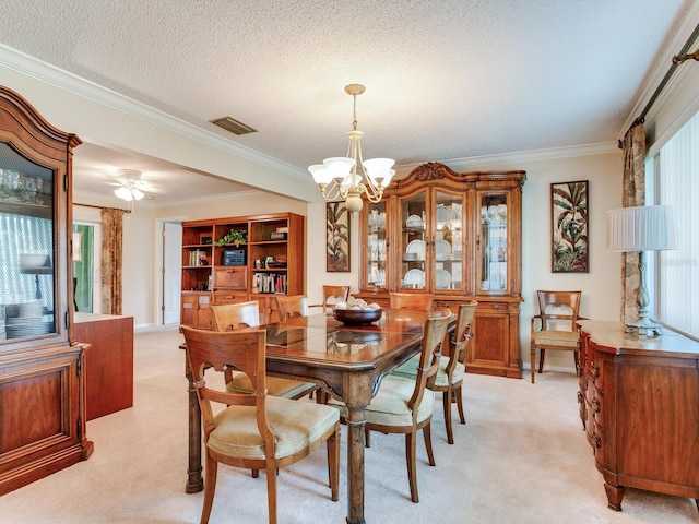 7216 N Mobley Rd, Odessa, FL 33556 - dining area featuring a chandelier, light carpet, crown molding, plenty of natural light, and a textured ceiling