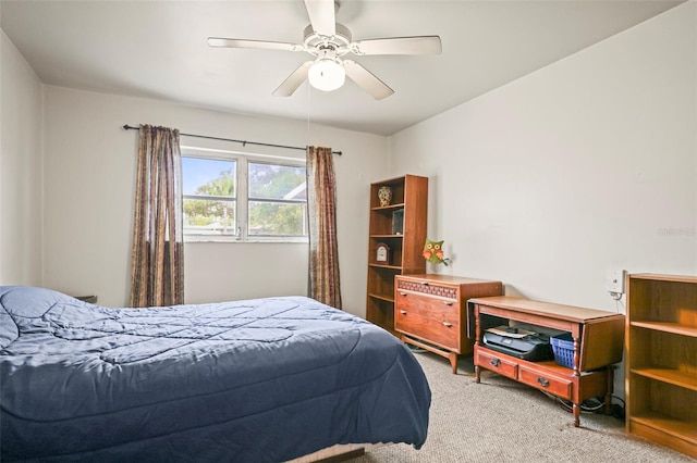 bedroom with carpet and a ceiling fan