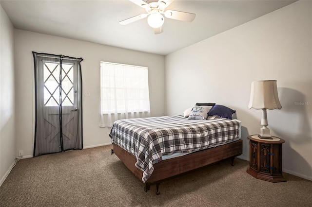 bedroom featuring carpet, baseboards, and ceiling fan