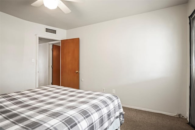 bedroom with carpet floors, baseboards, and a ceiling fan