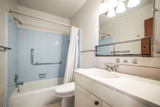 full bathroom with shower / bath combo with shower curtain, vanity, and toilet