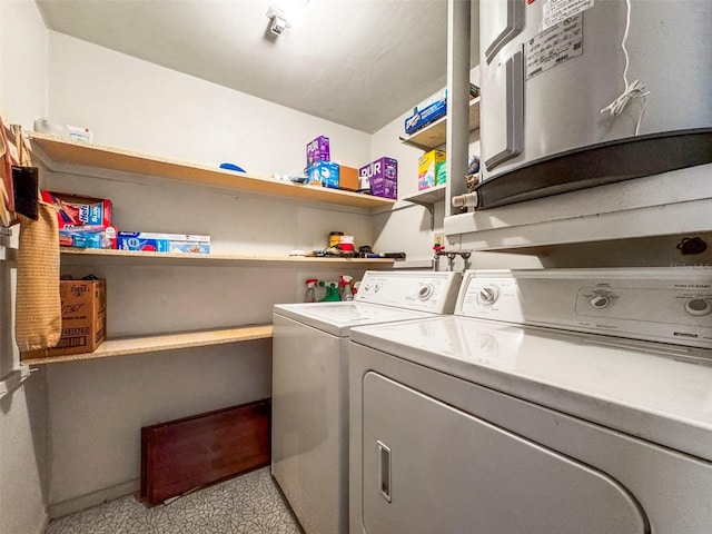 laundry room featuring washing machine and dryer