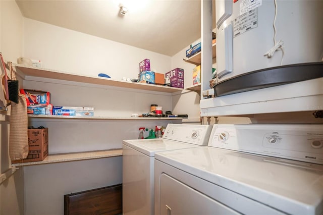 laundry room featuring washing machine and dryer