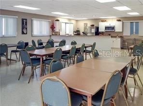 dining room featuring a drop ceiling