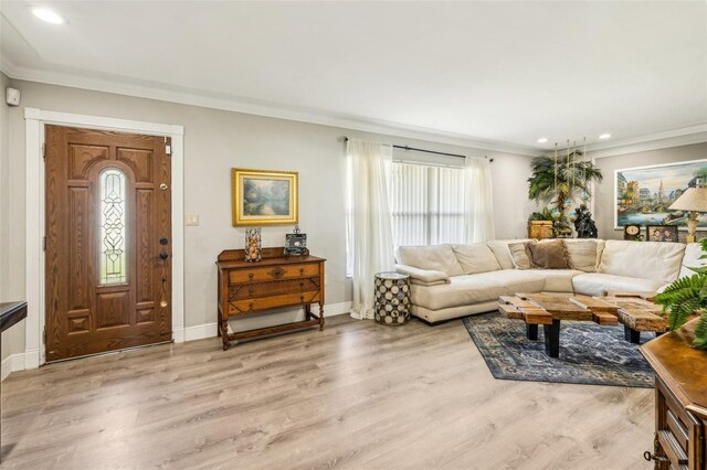 5245 18th St N, Saint Petersburg, FL 33714 - living area featuring ornamental molding, light wood-style flooring, recessed lighting, and baseboards