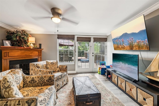 5245 18th St N, Saint Petersburg, FL 33714 - living area with a ceiling fan, crown molding, and a glass covered fireplace