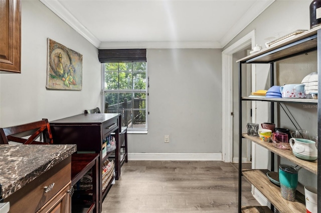 5245 18th St N, Saint Petersburg, FL 33714 - home office featuring crown molding, wood finished floors, and baseboards