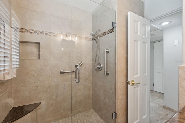4027 25th Ave N, Saint Petersburg, FL 33713 - bathroom with a stall shower and tile patterned floors