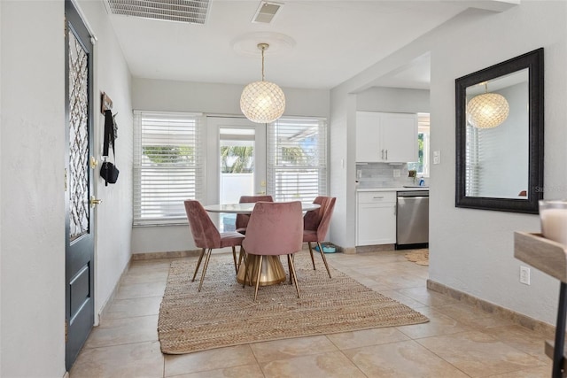 4027 25th Ave N, Saint Petersburg, FL 33713 - dining area with baseboards