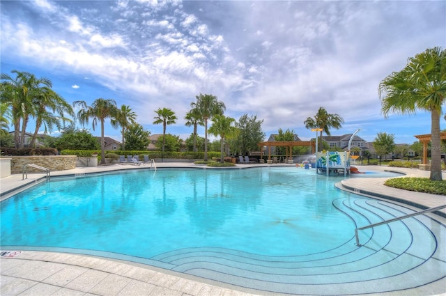 community pool with a patio