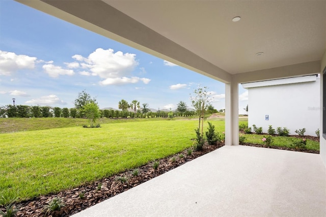 view of patio / terrace with a rural view