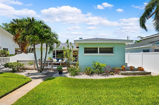 view of front of home with an outdoor living space and stucco siding