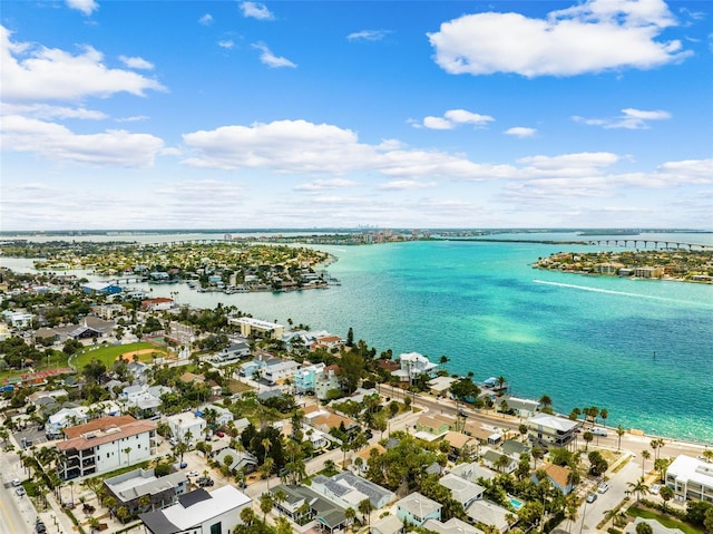 aerial view of residential area with a large body of water
