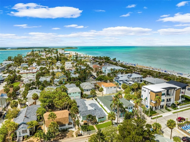 aerial perspective of suburban area featuring a nearby body of water