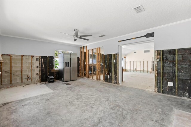 106 13th Ave, St Pete Beach, FL 33706 - unfurnished living room featuring ornamental molding and a ceiling fan