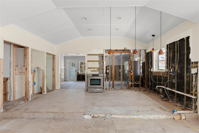 106 13th Ave, St Pete Beach, FL 33706 - miscellaneous room with vaulted ceiling and heating unit