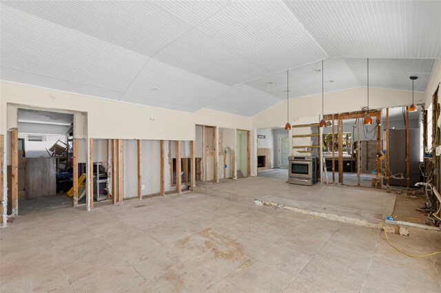 106 13th Ave, St Pete Beach, FL 33706 - misc room featuring vaulted ceiling and heating unit