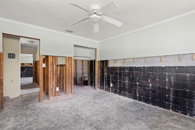 106 13th Ave, St Pete Beach, FL 33706 - unfurnished bedroom featuring crown molding, a textured ceiling, and ceiling fan
