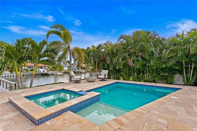 1960 Montana Ave NE, Saint Petersburg, FL 33703 - view of pool with a water view, a patio, and a pool with connected hot tub