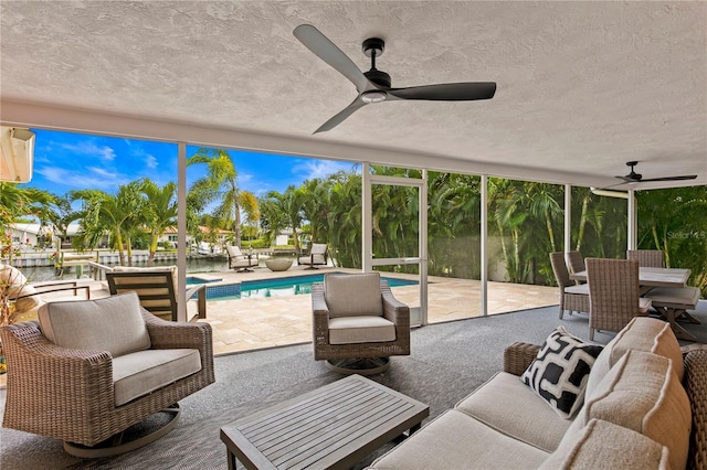 1960 Montana Ave NE, Saint Petersburg, FL 33703 - view of patio / terrace featuring ceiling fan, an outdoor pool, and an outdoor hangout area