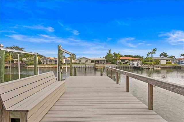 1960 Montana Ave NE, Saint Petersburg, FL 33703 - dock area with a water view and a residential view