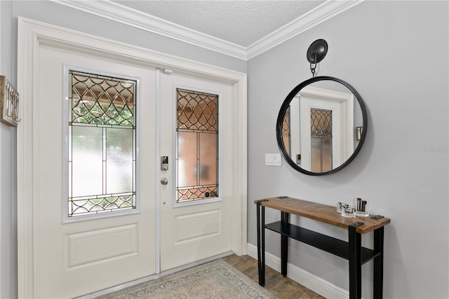 1960 Montana Ave NE, Saint Petersburg, FL 33703 - foyer with french doors, a textured ceiling, crown molding, wood finished floors, and baseboards