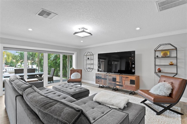 1960 Montana Ave NE, Saint Petersburg, FL 33703 - living area featuring baseboards, recessed lighting, a textured ceiling, and crown molding
