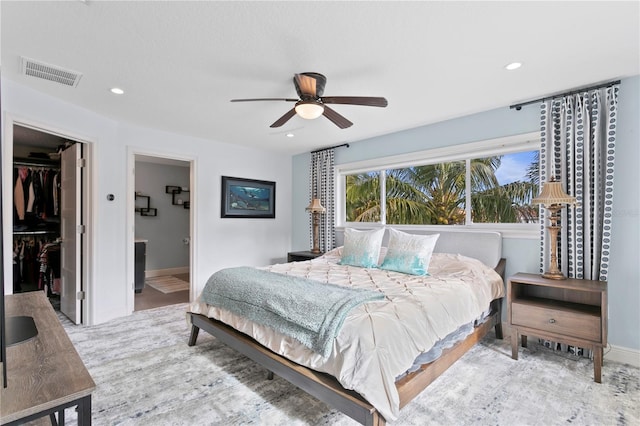 1960 Montana Ave NE, Saint Petersburg, FL 33703 - bedroom with a walk in closet, a closet, baseboards, recessed lighting, and ensuite bathroom