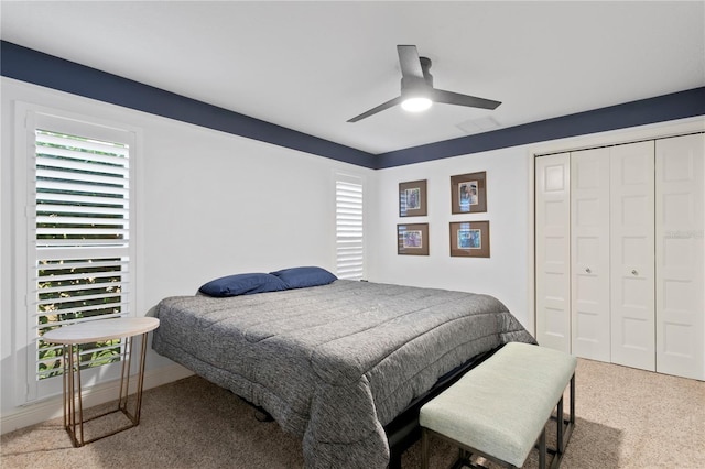 1960 Montana Ave NE, Saint Petersburg, FL 33703 - bedroom featuring carpet, a closet, ceiling fan, and baseboards