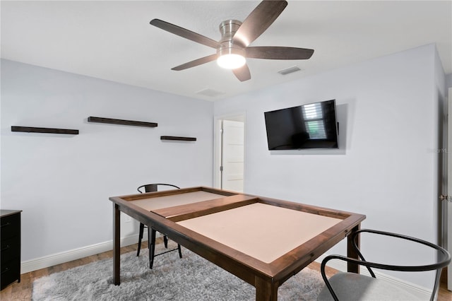 1960 Montana Ave NE, Saint Petersburg, FL 33703 - office space featuring light wood finished floors, a ceiling fan, and baseboards