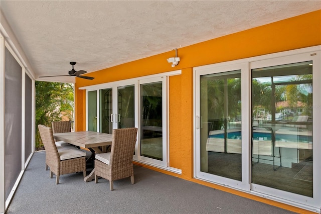 1960 Montana Ave NE, Saint Petersburg, FL 33703 - sunroom with a textured ceiling and carpet flooring