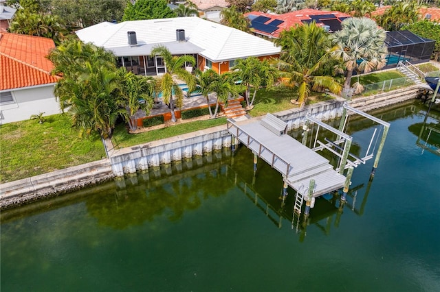 1960 Montana Ave NE, Saint Petersburg, FL 33703 - dock with a water view, boat lift, and an outdoor pool