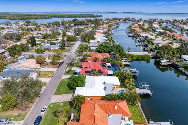 1960 Montana Ave NE, Saint Petersburg, FL 33703 - aerial perspective of suburban area with a nearby body of water