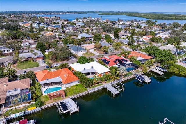 1960 Montana Ave NE, Saint Petersburg, FL 33703 - aerial perspective of suburban area with a large body of water