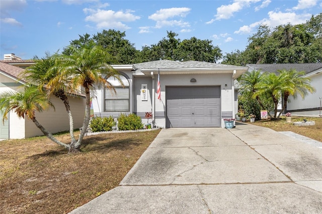 640 Lake Dexter Cir, Winter Haven, FL 33884 - ranch-style home featuring a garage, stucco siding, and concrete driveway