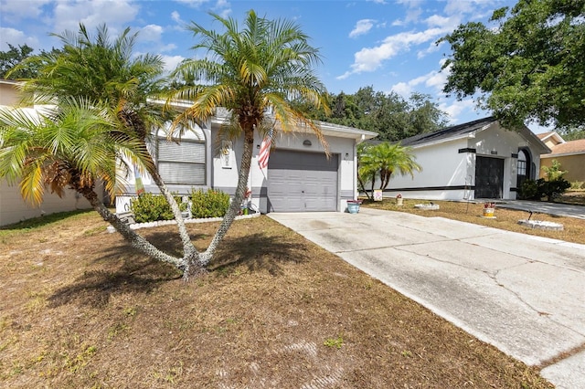640 Lake Dexter Cir, Winter Haven, FL 33884 - ranch-style home featuring concrete driveway and a garage