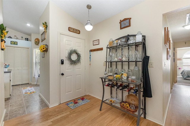 640 Lake Dexter Cir, Winter Haven, FL 33884 - entrance foyer featuring wood finished floors and baseboards