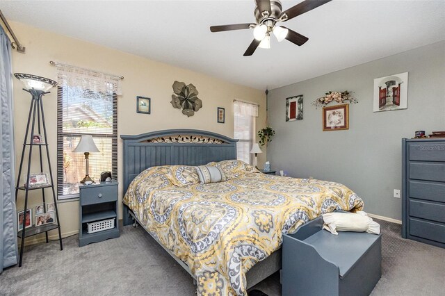 640 Lake Dexter Cir, Winter Haven, FL 33884 - carpeted bedroom featuring a ceiling fan and baseboards