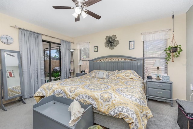 640 Lake Dexter Cir, Winter Haven, FL 33884 - carpeted bedroom featuring access to exterior and ceiling fan