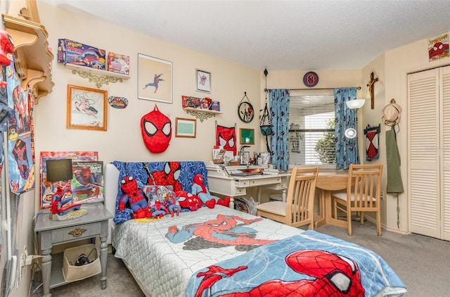 640 Lake Dexter Cir, Winter Haven, FL 33884 - carpeted bedroom with a textured ceiling and a closet