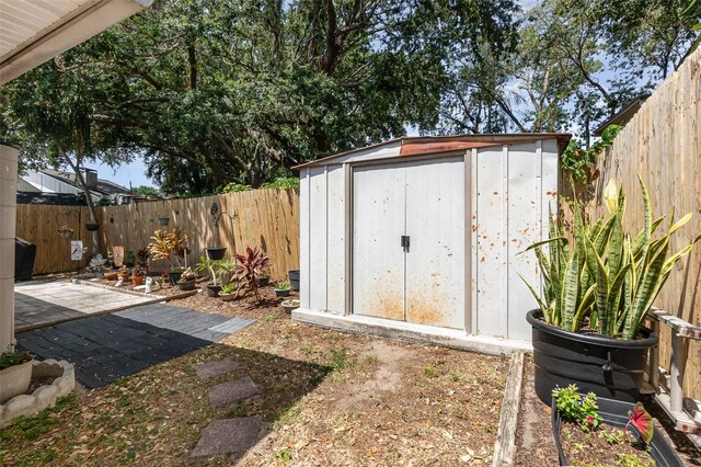 640 Lake Dexter Cir, Winter Haven, FL 33884 - view of shed featuring a fenced backyard