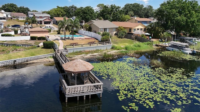 640 Lake Dexter Cir, Winter Haven, FL 33884 - dock area featuring a water view, a residential view, a gazebo, and fence