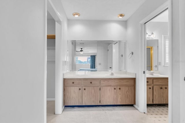 13533 Bay Lake Ln, Tampa, FL 33618 - full bathroom featuring vanity and a ceiling fan