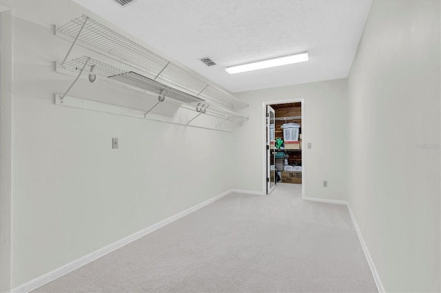 13533 Bay Lake Ln, Tampa, FL 33618 - walk in closet featuring carpet floors