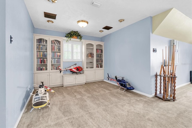 13533 Bay Lake Ln, Tampa, FL 33618 - rec room with light carpet and baseboards