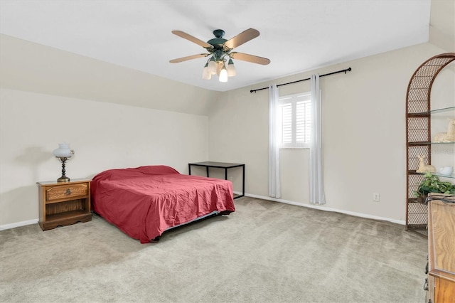13533 Bay Lake Ln, Tampa, FL 33618 - carpeted bedroom with lofted ceiling, baseboards, and a ceiling fan