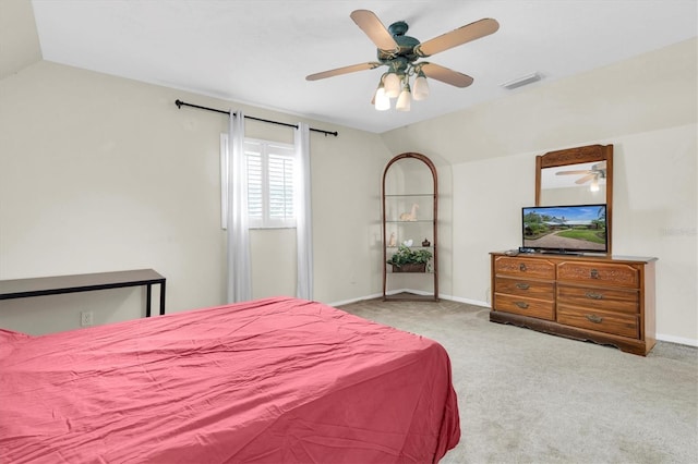 13533 Bay Lake Ln, Tampa, FL 33618 - carpeted bedroom featuring lofted ceiling, baseboards, and ceiling fan