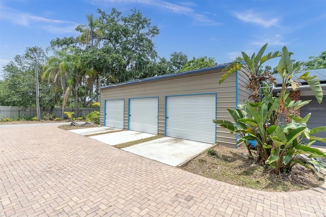 13533 Bay Lake Ln, Tampa, FL 33618 - detached garage with decorative driveway