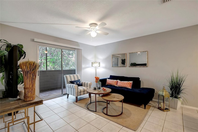 1400 Gandy Blvd N Unit 1504, Saint Petersburg, FL 33702 - living area featuring ceiling fan, light tile patterned flooring, and baseboards