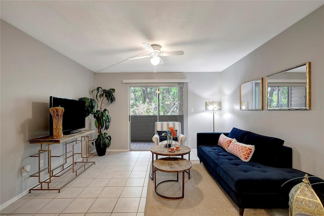 1400 Gandy Blvd N Unit 1504, Saint Petersburg, FL 33702 - living room with a ceiling fan, light tile patterned floors, and baseboards